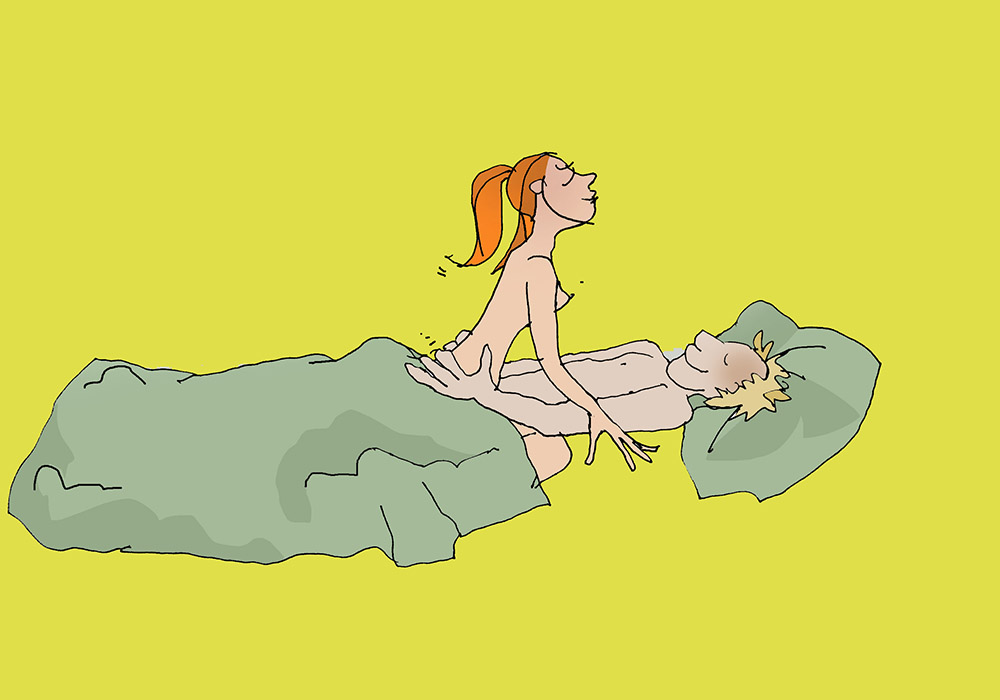 Eine Frau und ein Mann haben Geschlechtsverkehr im Bett in Reiterstellung