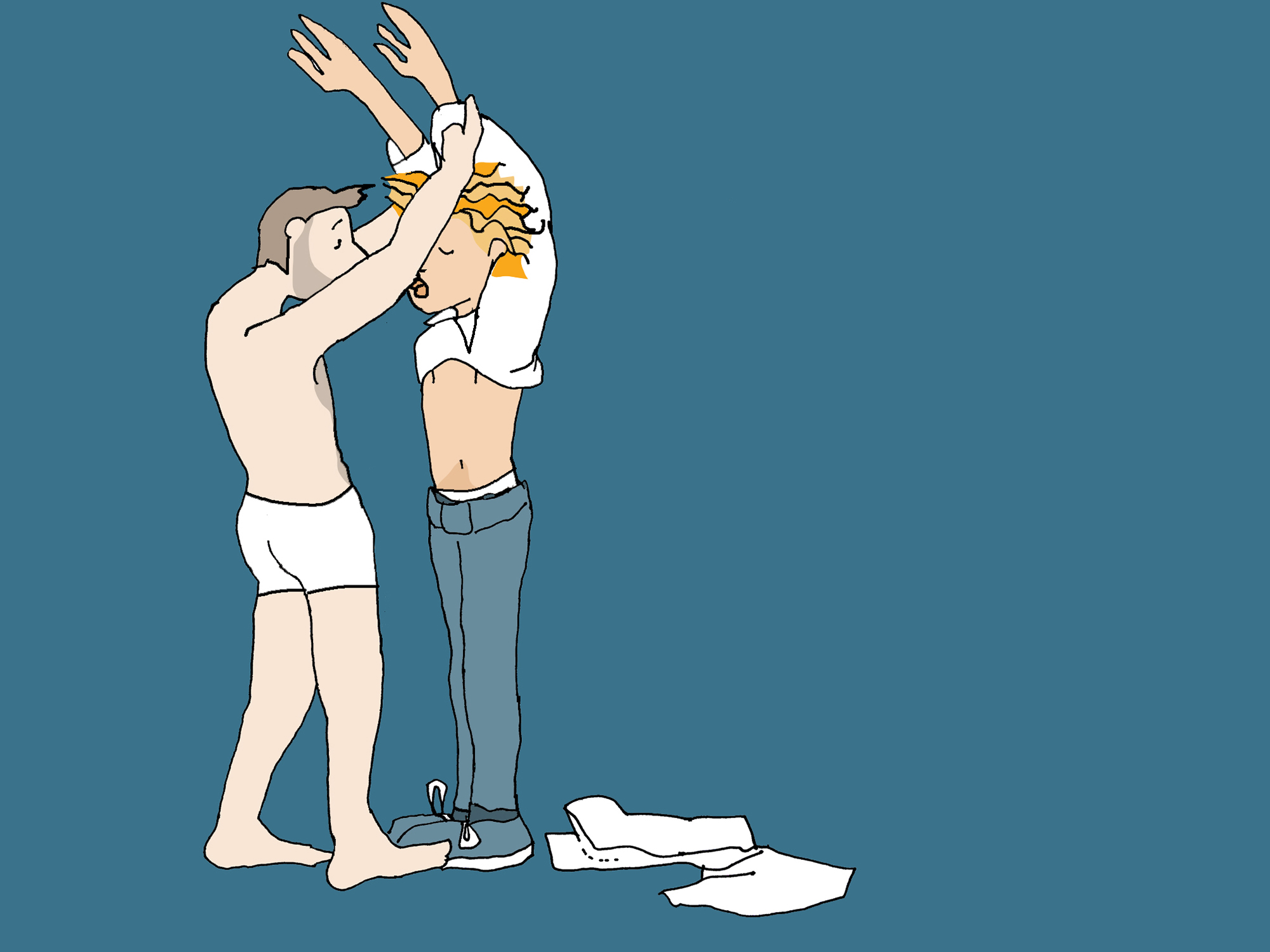 Two men stand in front of a blue background. One is only wearing underpants and takes off the other man's top.